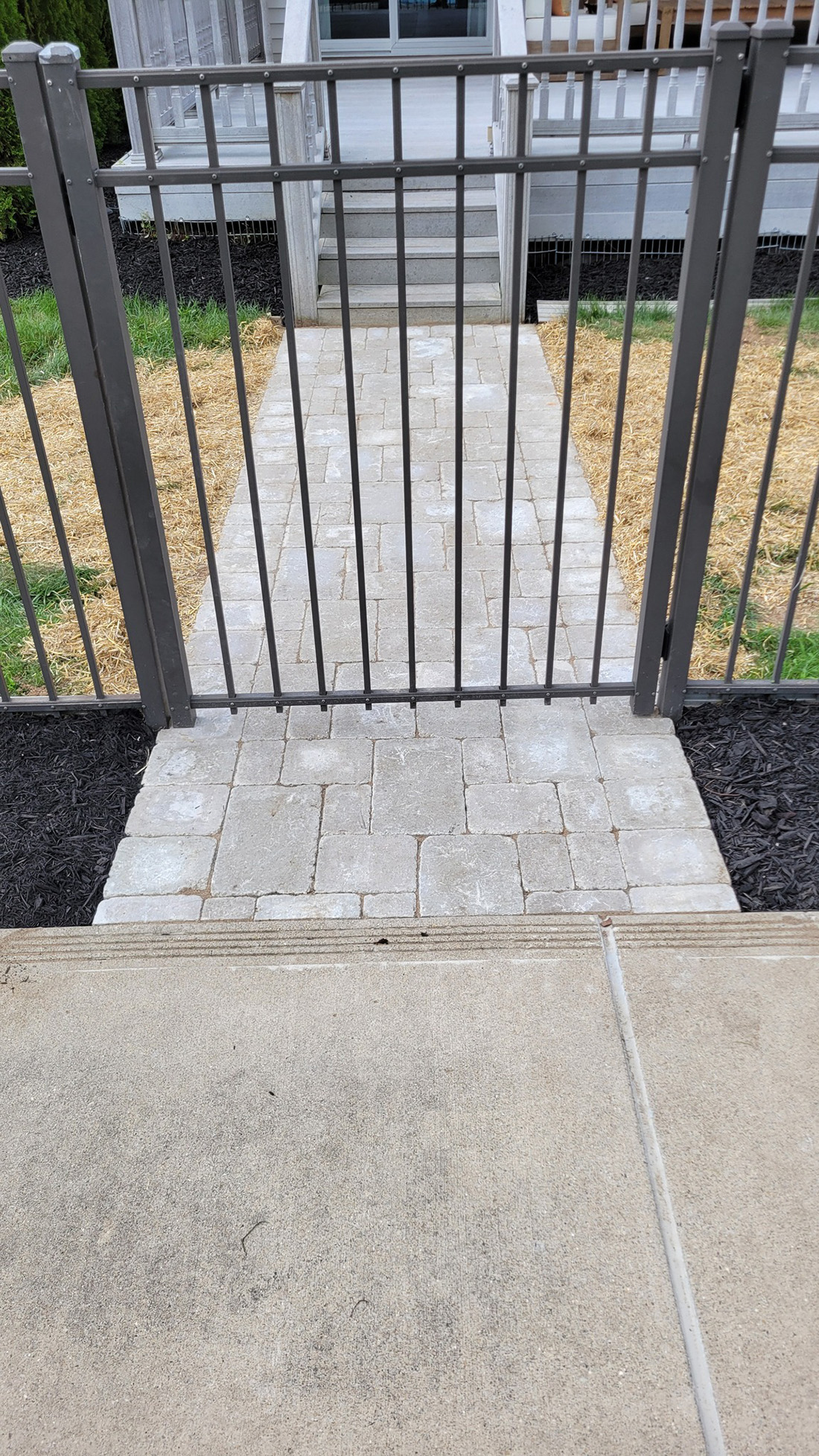 Wallace Works residential front yard landscaping with Japanese maple and black mulch beds, Jackson MI