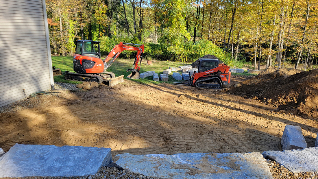 Wallace Works Kubota excavator and skid steer on fall excavation and grading project