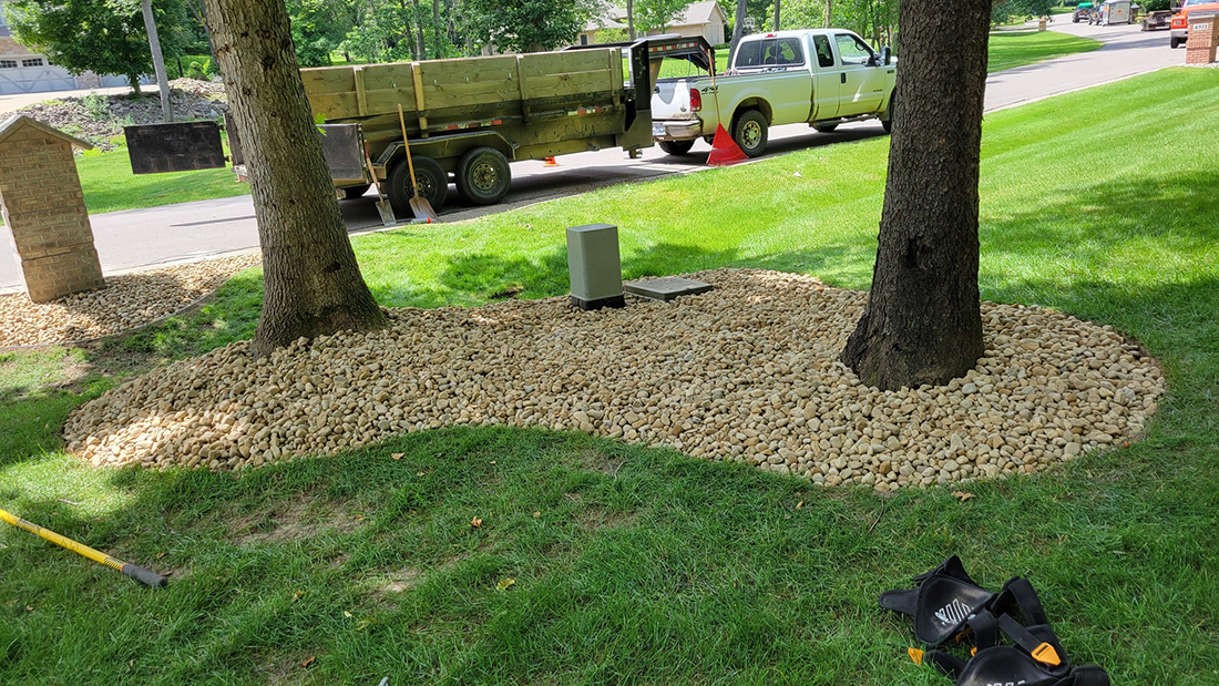 Large residential property with dual natural stone retaining walls, Jackson County MI